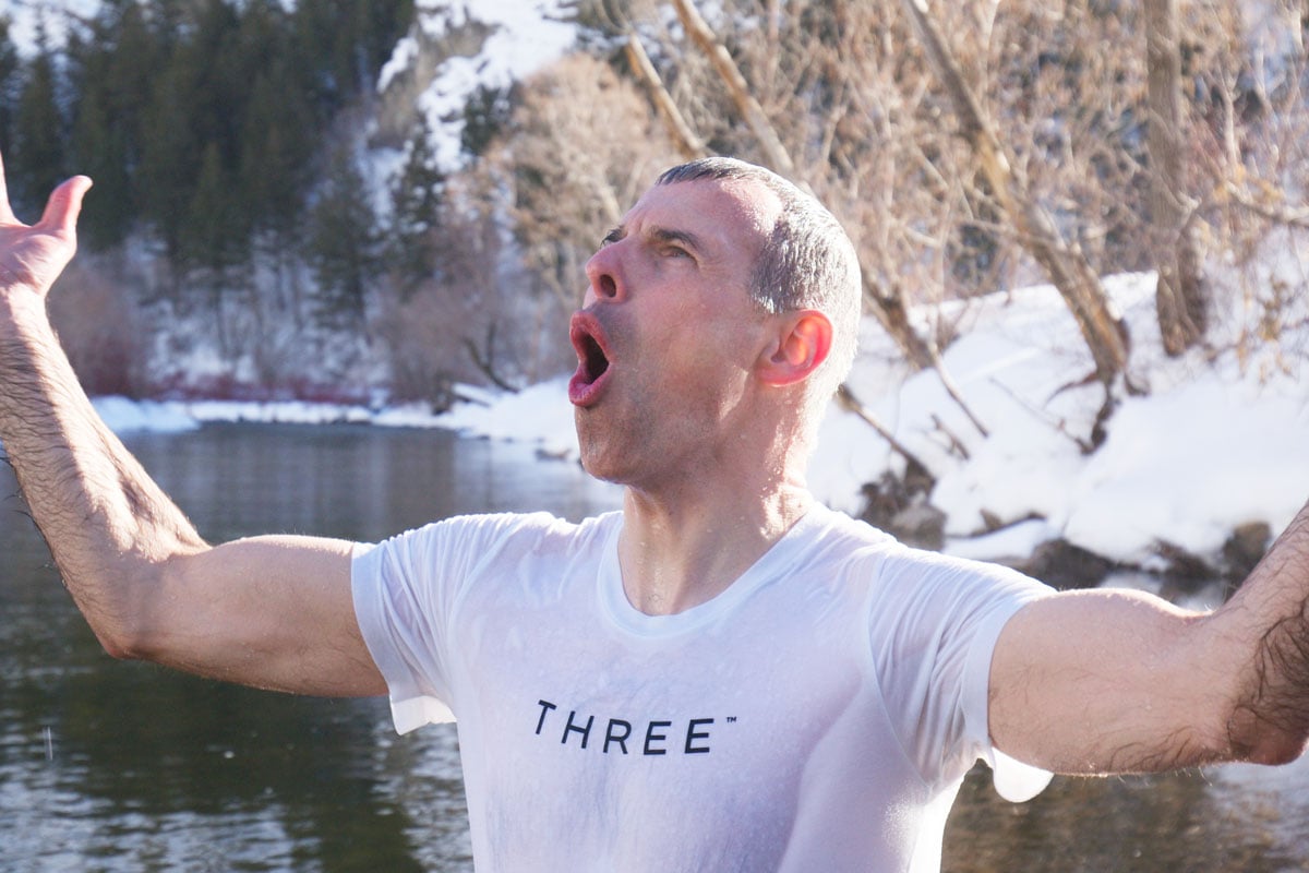 Dr Dan Gubler doing a cold plunge in the rocky mountaoins