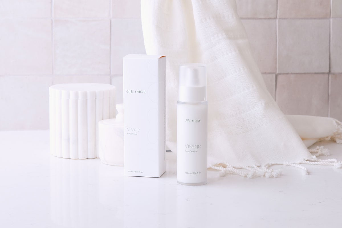 Visage Pure Cleanse by THREE sitting in a beautiful bright bathroom